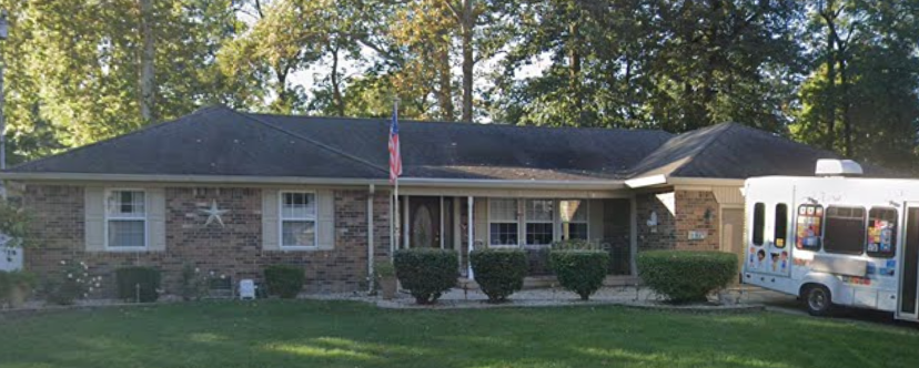 Brick ranch home before roof replacement