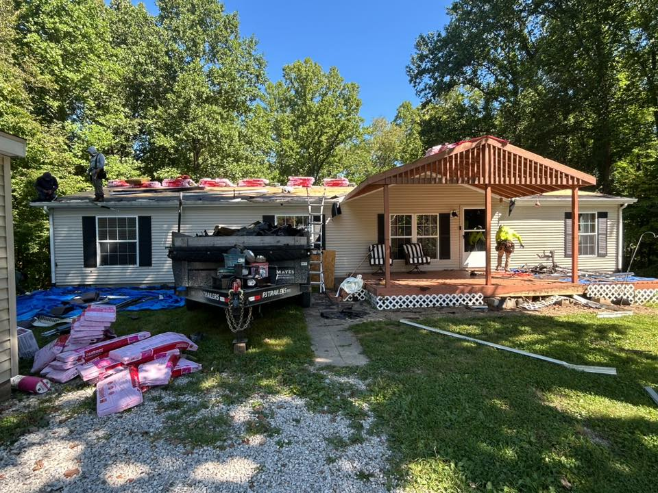 Ranch home with garage during roof replacement