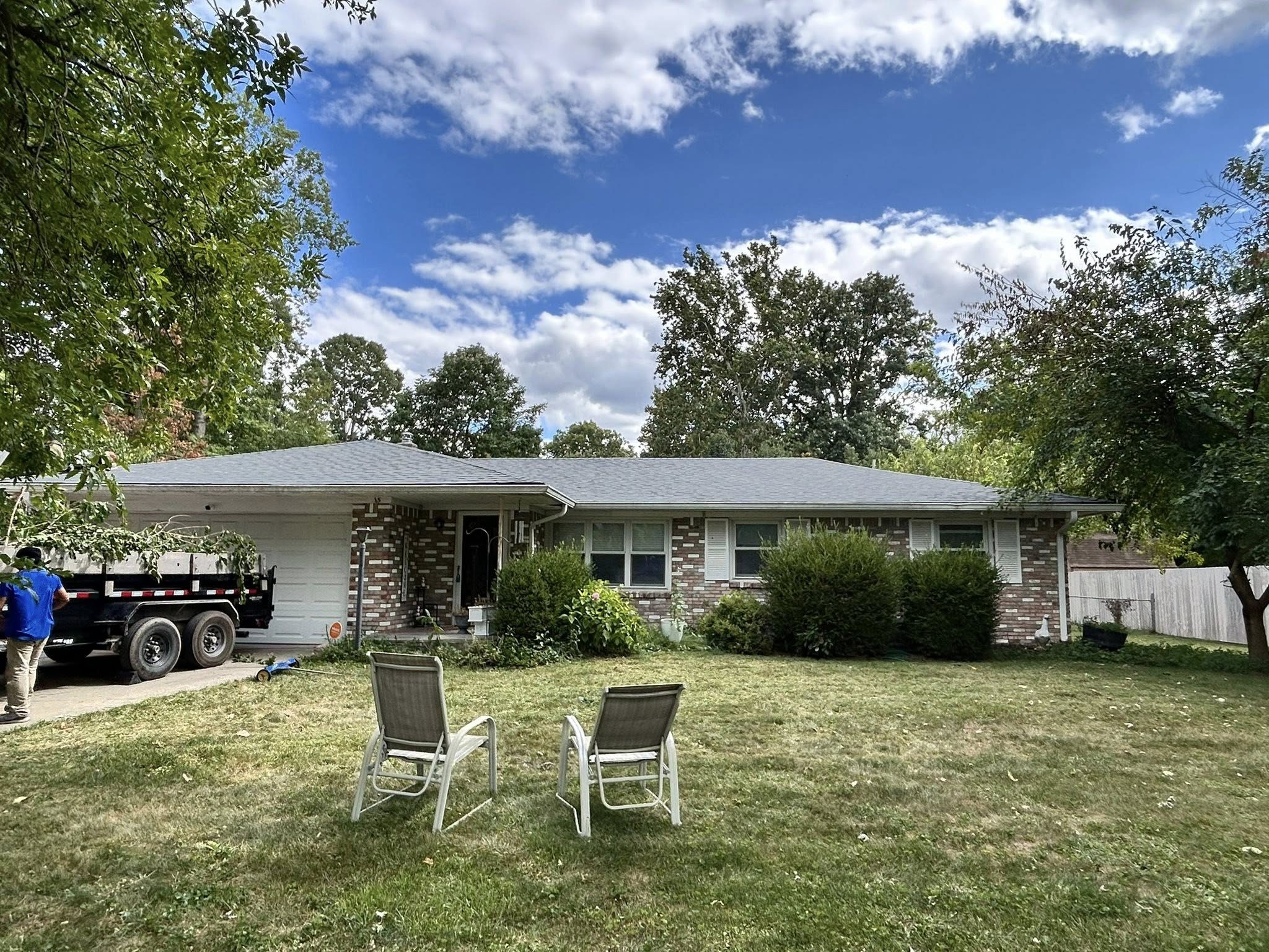 Completed stone accent ranch home roof replacement